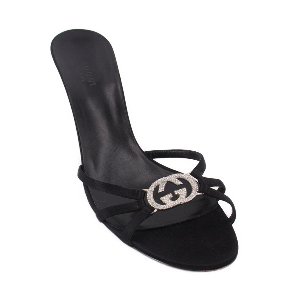 Black heeled mule sandal with GG logo and crisscross straps