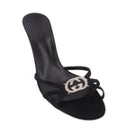 Black heeled mule sandal with GG logo and crisscross straps