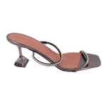 Pewter crystal heeled sandals with clear block heel, toe loop, and side strap