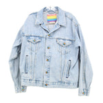 Light blue denim trucker jacket, button front, chest flap pockets, pride patch collar