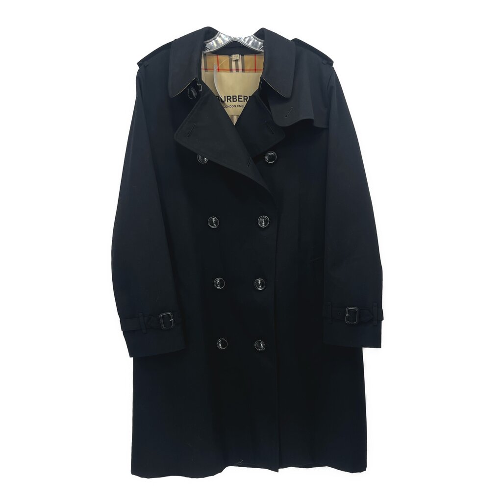 Black Burberry double-breasted trench coat with notched lapels and waist belt