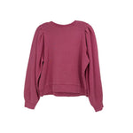 Pink long-sleeve crewneck top with puff shoulders and relaxed hem