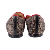 Back view of calf hair loafers with red lining and heel detailing; dark speckled uppers