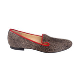 Calf hair loafer profile, red cutout detail at vamp, dark speckled finish