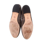 Calf hair loafer bottoms with brand marks and textured insole areas