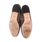 Calf hair loafer bottoms with brand marks and textured insole areas