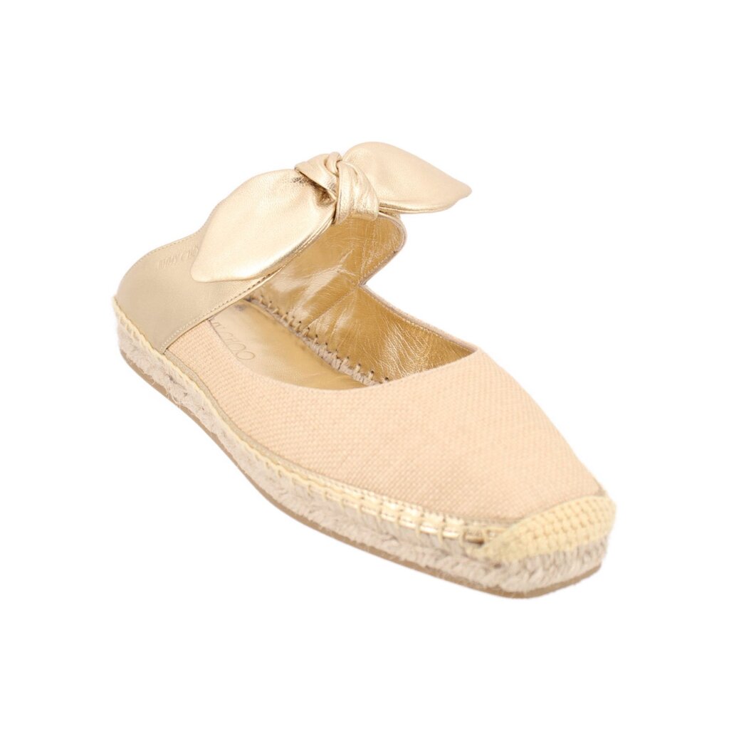 Beige espadrille flat shoes with gold bow at the vamp and jute sole