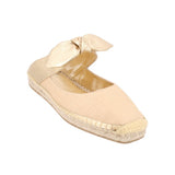 Beige espadrille flat shoes with gold bow at the vamp and jute sole