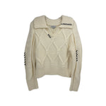Cream knit sweater with cable diamond pattern, crew neck, ribbed collar and cuffs