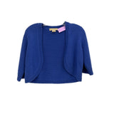 Blue cashmere cardigan with open front, shawl collar, and ribbed trim
