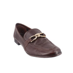 Brown leather loafer with gold-tone horsebit detail and stitched apron front