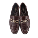 Pair of brown loafers with gold-tone horsebit and smooth moc-toe stitching