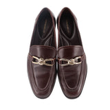 Pair of brown loafers with gold-tone horsebit and smooth moc-toe stitching