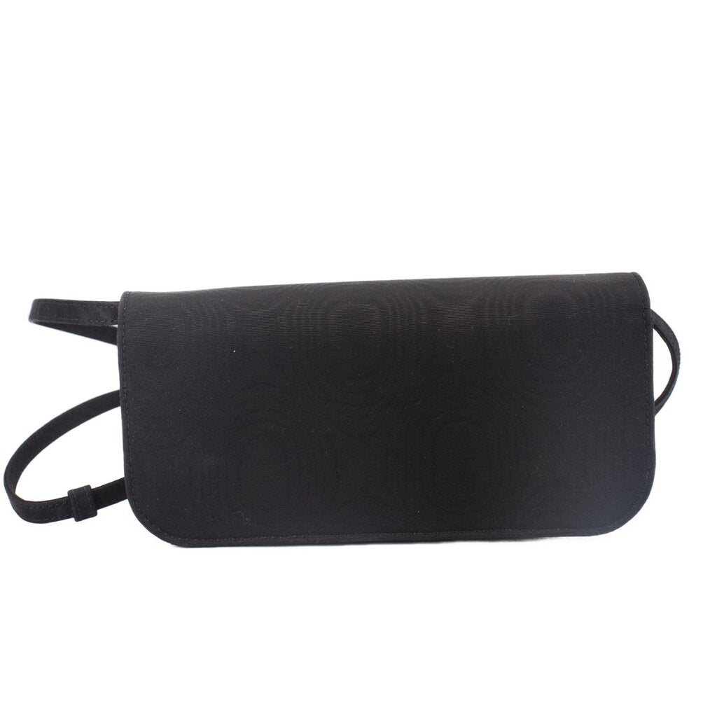 Black crossbody bag with smooth front flap and adjustable shoulder strap