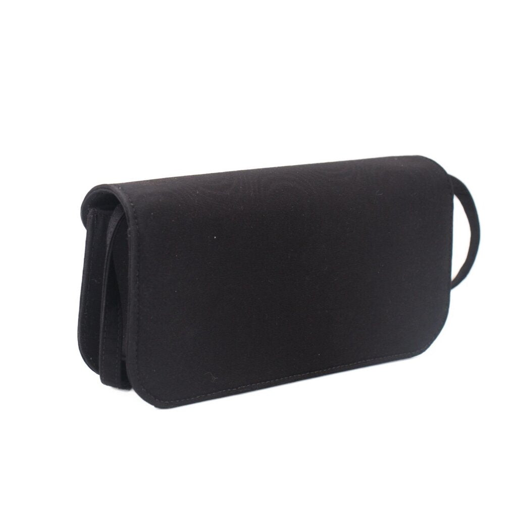 Black crossbody bag with single flap and adjustable shoulder strap