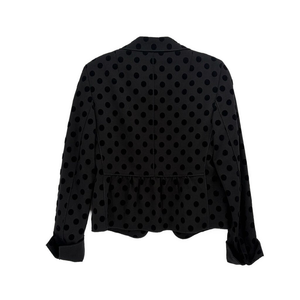 Black polka-dot blazer back view with central seam and long sleeves