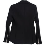 Black moto jacket back view with long sleeves and center back seam