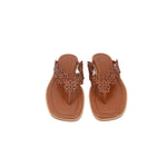 Pair of brown thong sandals with floral cutout top straps and toe post