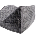 Gray patterned pouch corner with textured trim and stitched seam