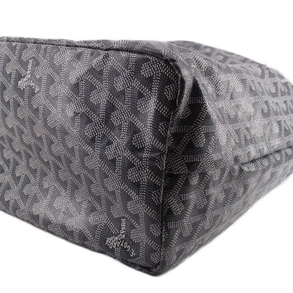 Gray patterned pouch end with zipper track and stitched border