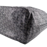 Gray patterned pouch end with zipper track and stitched border