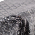 Gray patterned pouch fabric edge with stitching and zipper hardware