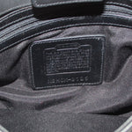COACH bag interior leather label with embossed text and serial number