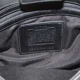 COACH bag interior leather label with embossed text and serial number
