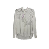 White long sleeve button-front top with embroidered leaf pattern and camp collar