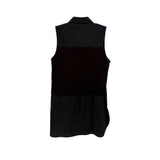 Black sleeveless top with banded dark center panel and back yoke