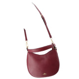 COACH NOMAD CROSSBODYS MAROON