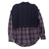 Navy cable-knit sweater vest layered over plaid button-up shirt, long sleeves, back view