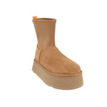 UGG Classic Dipper tan suede boots with orange pull tab and lug sole