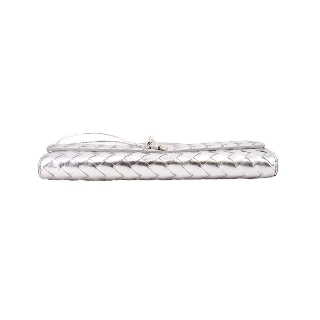 Silver metallic clutch with top handle, horizontal side profile view