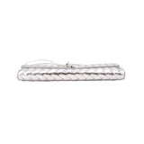 Silver metallic clutch with top handle, horizontal side profile view