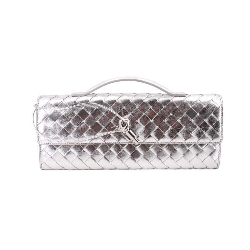 Silver metallic quilted clutch with top handle and clasp closure