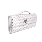 Silver metallic woven clutch with top handle and front clasp, angled view