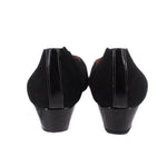 Black wedge flats heel view with low wedge heel and fabric back seam