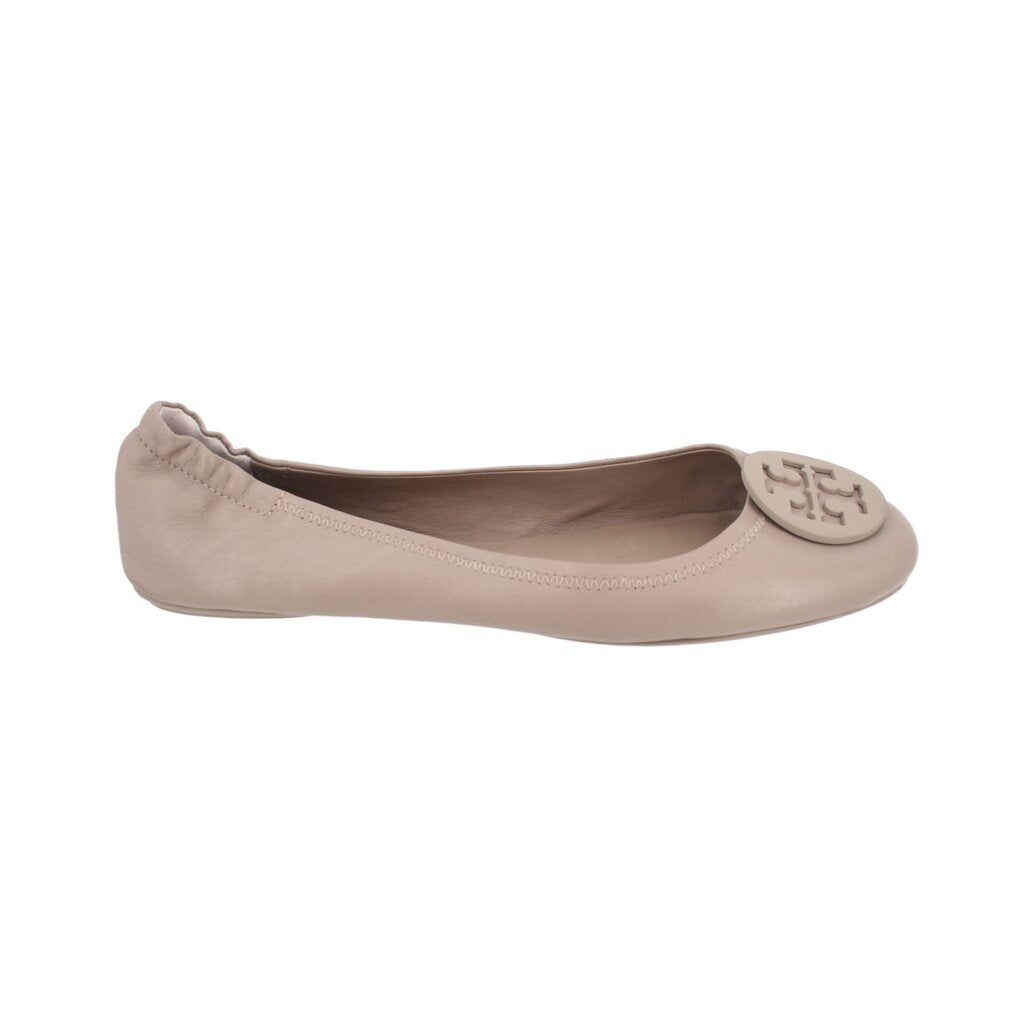 Taupe leather ballet flats with round logo medallion at vamp