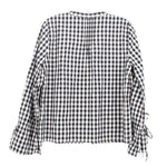 Black and white gingham check blouse back with tied sleeve cuffs