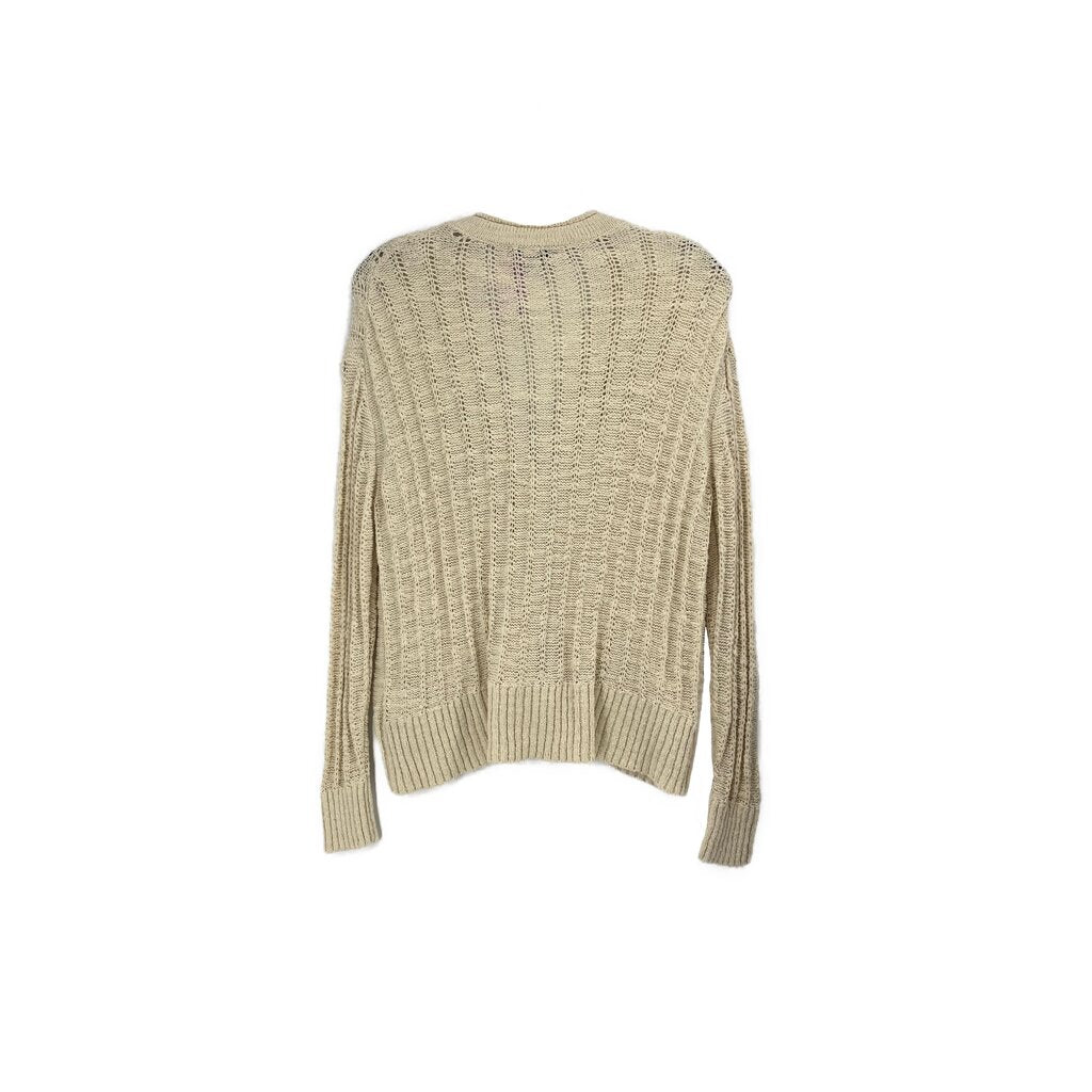 Cream knit cardigan with textured knit pattern and ribbed cuffs; back view