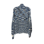 Blue patterned knit turtleneck sweater, patchwork-style horizontal stripes