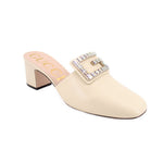 Gucci mule heels in light beige with embellished buckle strap and block heel