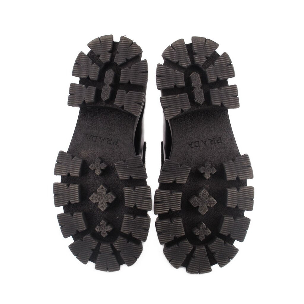 Black lug outsole tread for PRADA loafers, bottom close-up