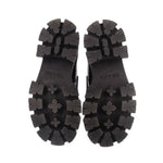 Black lug outsole tread for PRADA loafers, bottom close-up