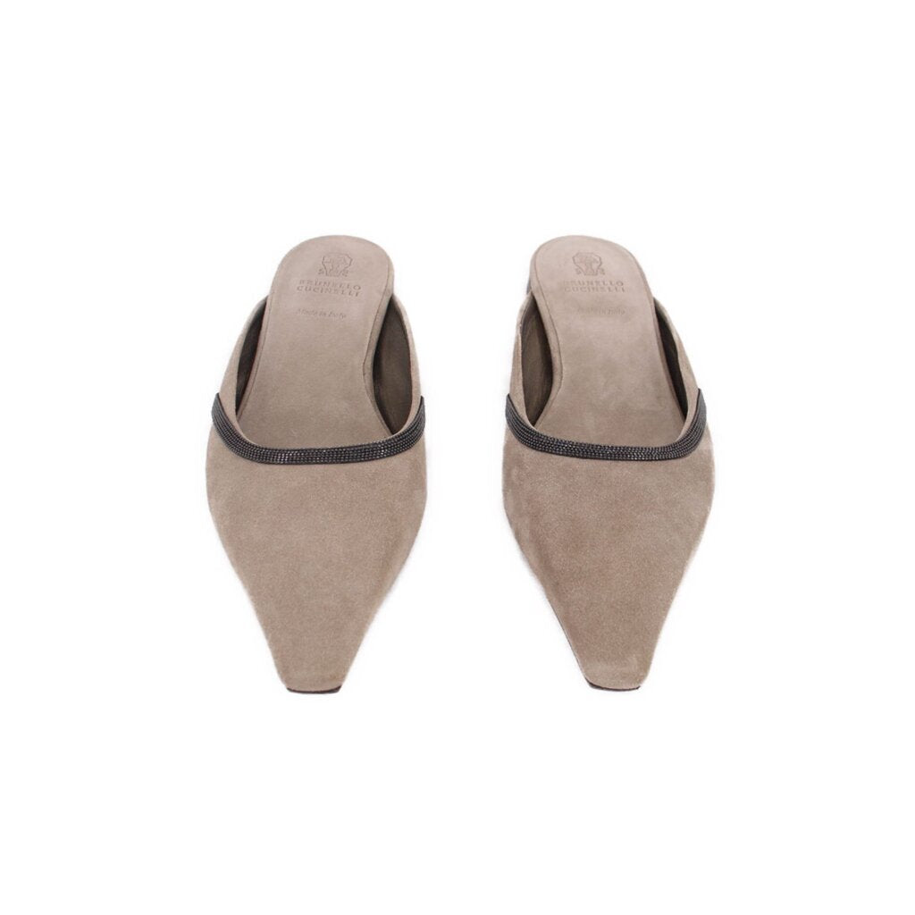 Pair of suede slip-on flats with dark elastic trim and pointed toe, flat sole