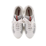 America's Cup sneakers pair, white uppers with gray panels and lace-up front