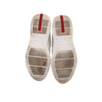 America's Cup sneakers outsole view, textured tread with white rubber and red strip