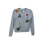 Light blue cardigan sweater with button front and colorful embroidered flowers