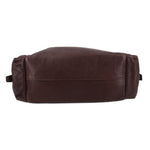 Brown PRADA crossbody bag underside view with stitched base and side handles